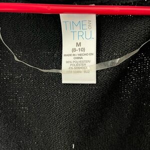 Medium long, sleeveless sweater